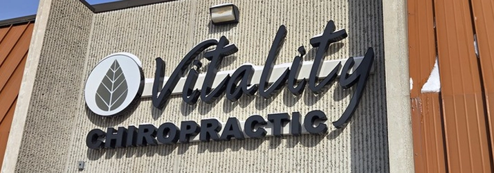 Vitality Chiropractic Sign on the front of the building.